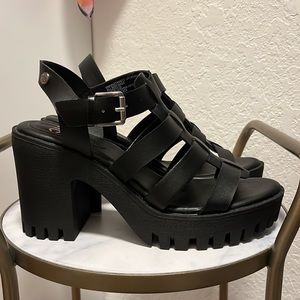 Brand new and never used black Madden NYC Women's Lug Fisherman Sandals